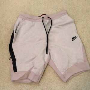 pink nike tech shorts